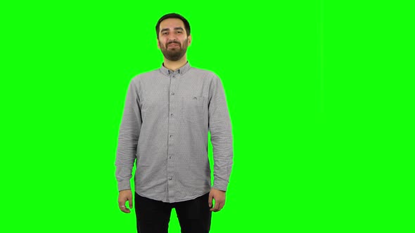 Brunette Guy Is Laughing. Green Screen