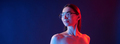 Futuristic neon lighting. Portrait of young woman that is indoors - PhotoDune Item for Sale