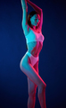 White underwear. Young woman is in the studio with neon lights - PhotoDune Item for Sale