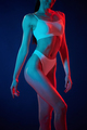 White underwear. Young woman is in the studio with neon lights - PhotoDune Item for Sale