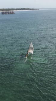 Vertical Video Boats in the Ocean Near the Coast of Zanzibar Tanzania