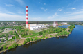 Panorama of power plant with pipes on lake in summer - PhotoDune Item for Sale