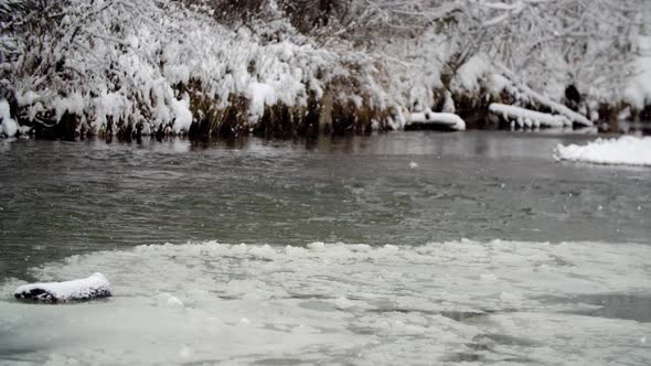 River Coast Covered with Snow