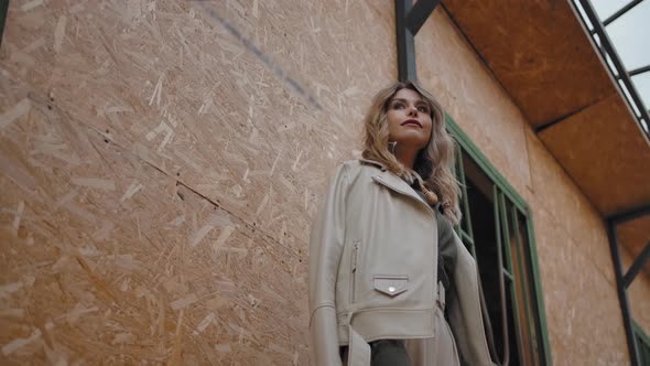 Dreamy Female Looking Away in Barn