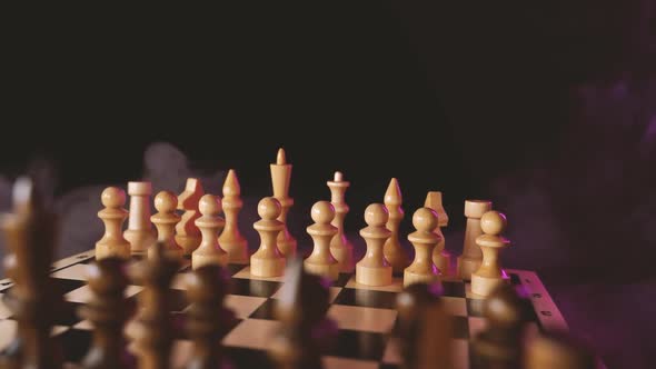 Close Up of White Chess Pieces on Board with Dissipating Steam