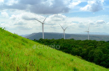 ergy. Wind turbines generate electricity. Windmill farm on a mountain with blue sky. Green technology. Renewable resource. Sustainable development.