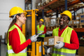 Happy multiracial people working inside logistic warehouse - PhotoDune Item for Sale