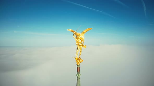 Amazing Aerial Close-up Shot of Golden St Michael Angel Statue on Top of Famous Mont Saint Michel