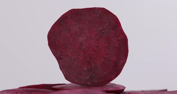 Sliced Red Beets Rotate in a Frame