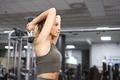 Adult caucasian woman training with weights at the gym - PhotoDune Item for Sale
