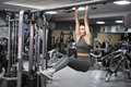 Caucasian young woman training at the gym - PhotoDune Item for Sale