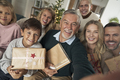 Caucasian family of different generation taking selfie with Christmas presents - PhotoDune Item for Sale