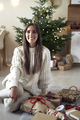 Portrait of smiling caucasian woman during Christmas - PhotoDune Item for Sale
