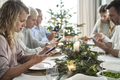 Family of caucasian people spending Christmas Eve with mobile phones - PhotoDune Item for Sale