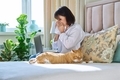 Woman sneezing allergic to domestic cat fur - PhotoDune Item for Sale