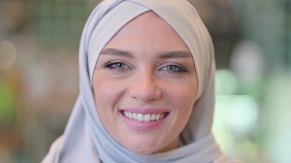 Face of Young Arab Woman in Hijab Looking at the Camera