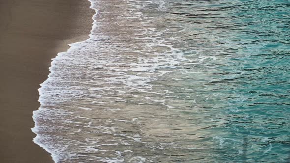 Waves breaking on the tropical beach at Thung Beach Ninh Thuan seen from Bãi Chuối banana point