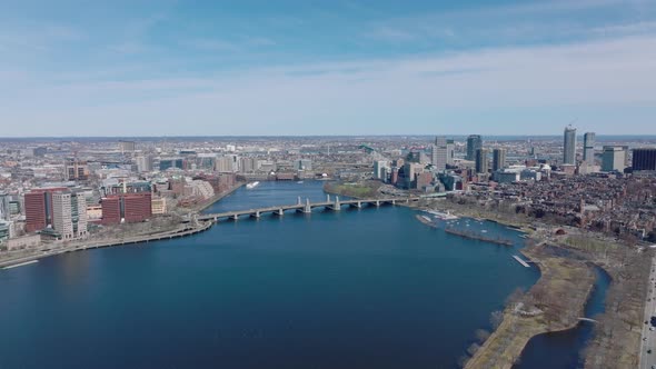 Forwards Fly Above Deep Blue Surface of Charles River at Longfellow Bridge