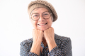 Close up portrait of beautiful elderly woman wearing glasses looking at camera smiling - PhotoDune Item for Sale
