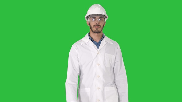 Science Engineer Walking in Safety Helmet and Glasses On