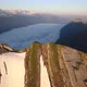 Revealing Aerial Shot Of A Sea Of Fog In The Swiss Mountains During Sunrise - VideoHive Item for Sale