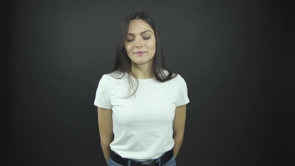 Confident Lady with Long Loose Hair Performs Deep Breath