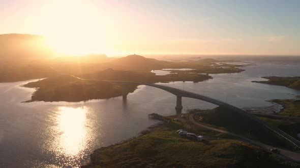 Flight over Fredvang bridge in the beautiful sunny evening, Lofoten Islands, Norway