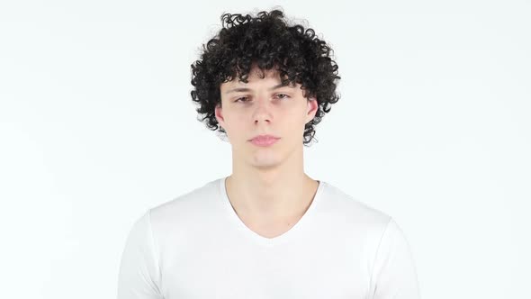 Portrait of Young Man with Curly Hairs
