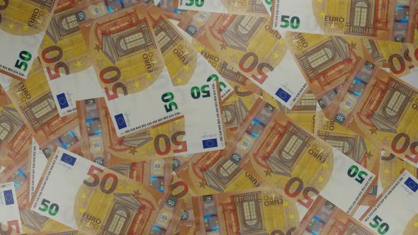 50 Euro bills background. Many banknotes.