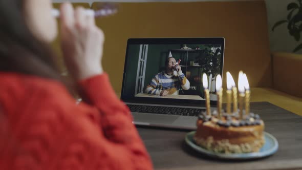 Happy Woman in Birthday Cap Celebrating Holiday Via Video Call Ogether with Her Friend During