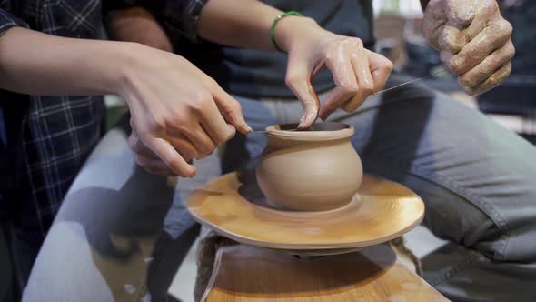 Making a Handmade Clay Pot in the Workshop. Pottery Lesson with Master.