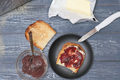 traditional country breakfast, toasts with jam and butter on rustic wooden table, top view - PhotoDune Item for Sale