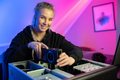Smiling E-sport Gamer Girl Installing New GPU Video Card in Her Gaming PC - PhotoDune Item for Sale