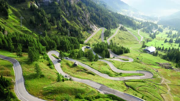 Stunning winding road at Passo Gardena, Dolomites, aerial view