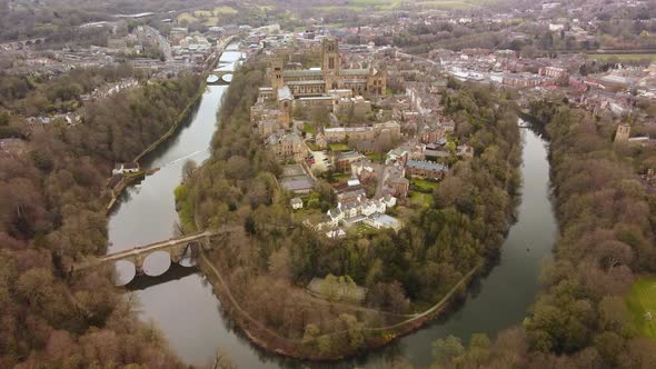 Aerial tracking shot of Durham Cathedral of the River Wear, United Kingdom (4K)