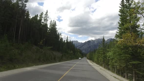 Driving cars on a mountain road