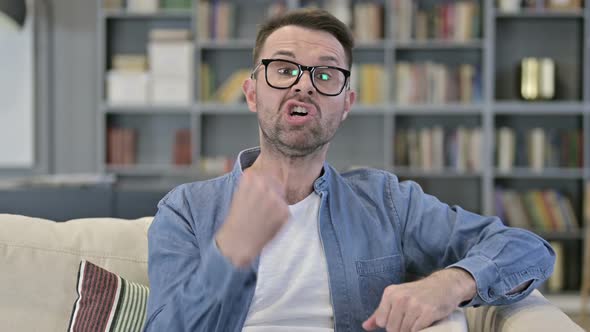 Portrait of Angry Young Man Shouting and Screaming