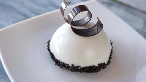 Mousse Dessert Decorated with Spiral Chocolate