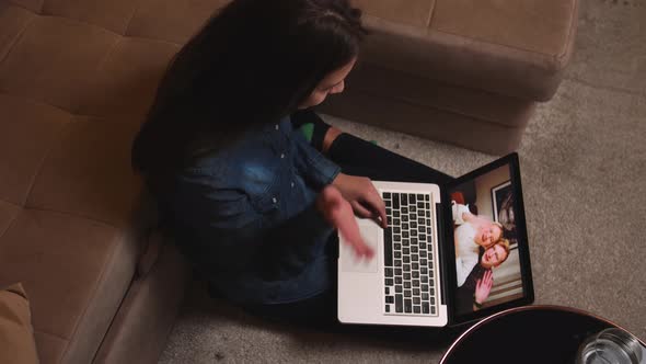 Pretty Smiling Woman Has Video Call Chatting on Laptop with Friends