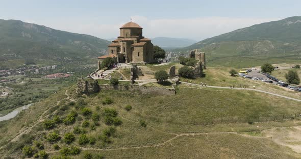 Mountaintop Monastery Of Jvari Near Mtskheta In Eastern Georgia. Aerial Pullback Shot