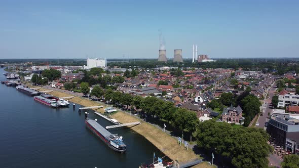 Gas-fired power station Clauscentrale behind city Maasbracht, the Netherlands