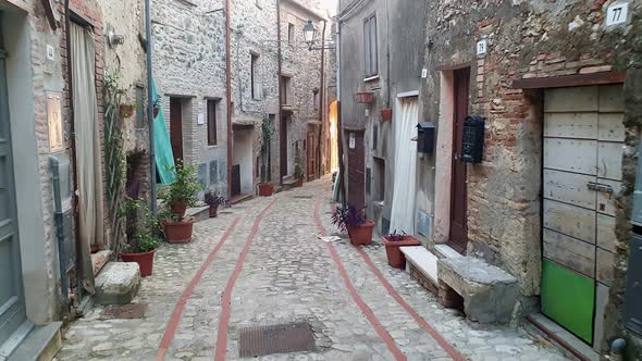 Picturesque first-person view of alley in Penna in Teverina old town. Slow-motion