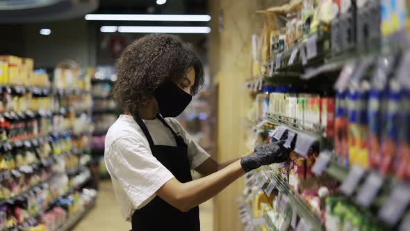 Female Staff in Mask Working at Grocery Section of Supermarket