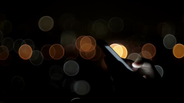 Use Smartphone With City Lights