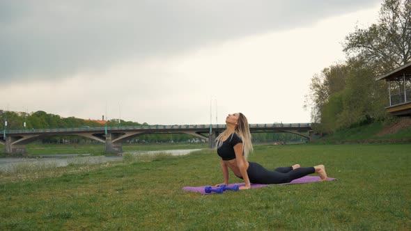 Beautiful Young Woman Performing a Spiritual Yoga Pose, Zen Wellness