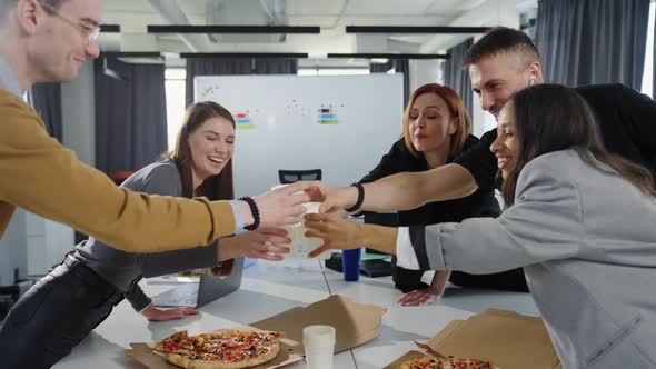 The Team Celebrates the Successful Start of the Project During the Lunch Break