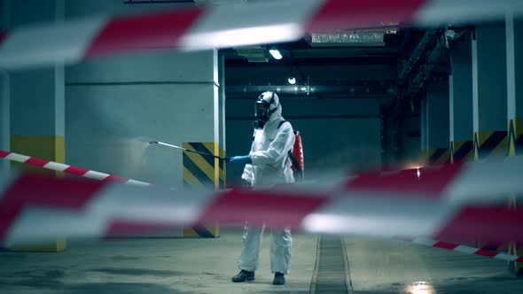 A Worker Uses Sprayer While Disinfecting During Pandemic.