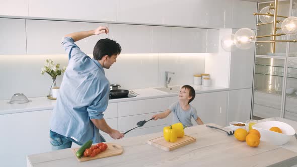 Father and Son Have Fun in the Kitchen