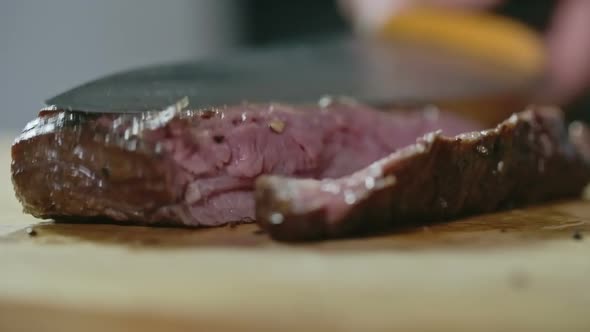 Cutting Medium Rare Steak