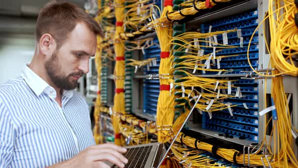 Engineer Working in Data Room